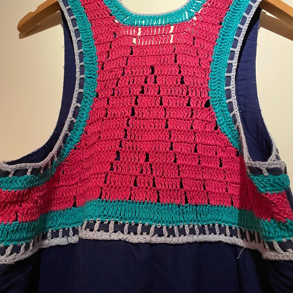 Knee length navy blue dress with pink crochet details.  86% cotton, 14% flax.